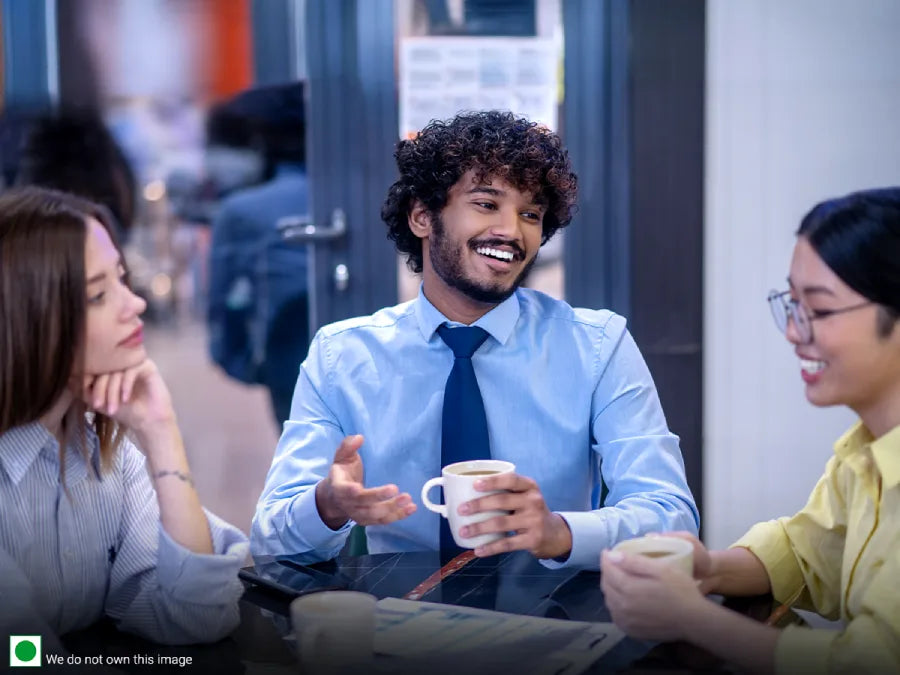 people drinking tea during a business meeting